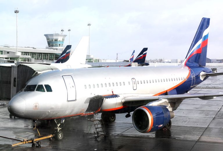 Cargo aircraft parked on an airport apron